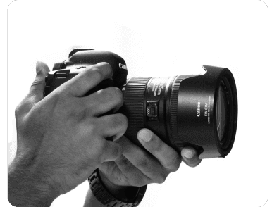 A creator with a camera